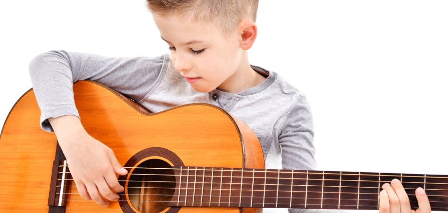 Portrait,Of,A,Cute,Boy,Playing,Acoustic,Guitar,Isolated,On Portrait,Of,A,Cute,Boy,Playing,Acoustic,Guitar,Isolated,On